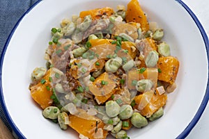 Sautéed pumpkin with broad beans. Traditional Spanish recipe.