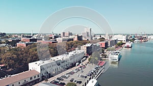 Savannah, Georgia, USA. Aerial view of city ad river on a sunny day