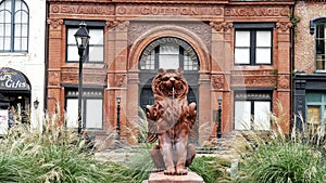SAVANNAH, GEORGIA, USA - OCTOBER, 22, 2017: close up of the lion statue outside the savannah cotton exchange in georgia