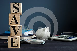 Save from cubes and piggy bank. Money savings concept.