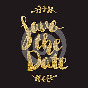Save the date. Hand drawn lettering with golden flares on dark b
