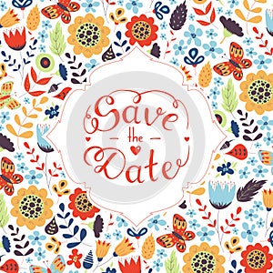 Save the date hand lettering on floral pattern