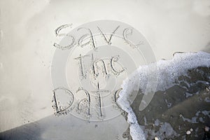 Save the date, in sand photo