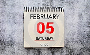 Save the Date written on a calendar - February 05