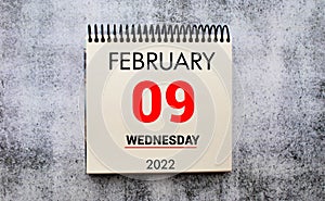 Save the Date written on a calendar - February 09