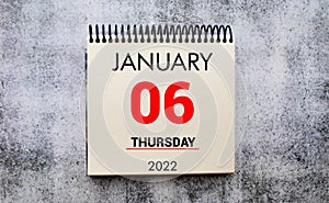 Save the Date written on a calendar - January 06 - Nicht vergessen in german