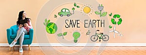 Save earth concept with woman using a tablet