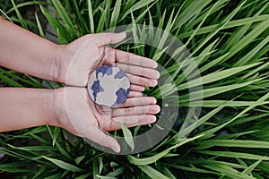 Save The Earth for Sustainable Lifestyles Concept, Protect Planet Earth for Sustainable Resource. Human Hands Holding Globe Symbol