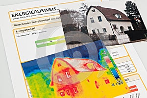 Save energy. house with thermal imaging camera photo