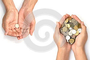 Save money concept with Hand holding coins on white background