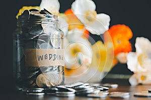 Save money for wedding and planning wedding concept. Sustainable financial goal for family life or married life. Miniature wedding