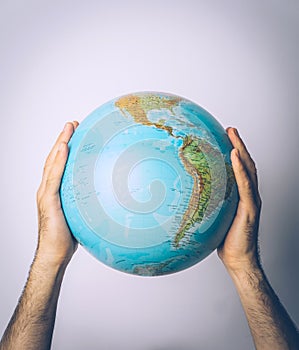 Save planet. Globe in the hands of man. Save Earth concept