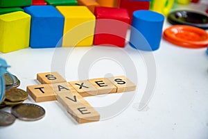 Save and taxes keyword on wood block