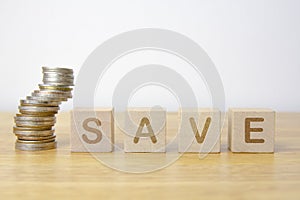 SAVE on wooden background