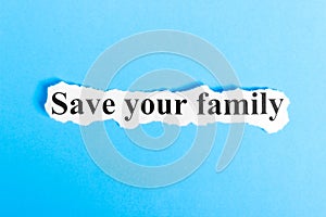 Save your family text on paper. Word Save your family on a piece of paper. Concept Image