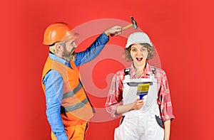 Save your head. new house construction concept. Portrait of family wearing hardhat. Construction worker in protective