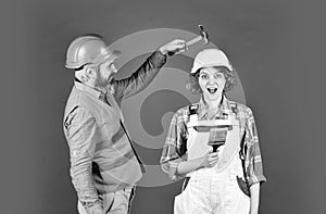 save your head. new house construction concept. Portrait of family wearing hardhat. Construction worker in protective