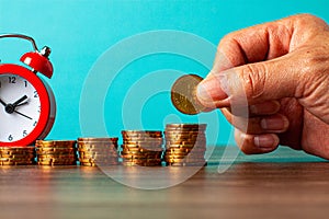 Saving with clock, table of coins