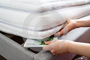 Saving Euro Money Under Bed Mattress