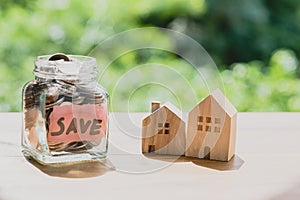 Saving money for buying house concept