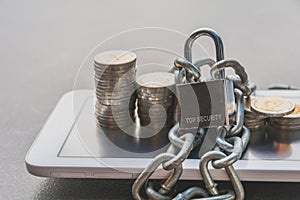 Saving money concept and money coin stack on smart phone with ch