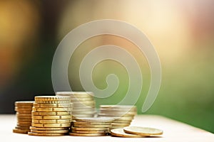 Saving money concept preset by money coins stacked on each other in different positions for growing your business. photo
