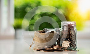 Saving money concept preset by Male hand putting money coin stack growing business, Finance and Investment Concept