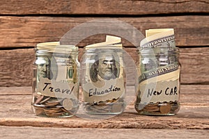 Saving Money Through Jar Money System. photo