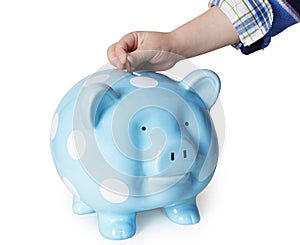 Saving money in a piggybank photo