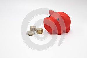 Saving money for a rainy day. Piggy banks on a white background