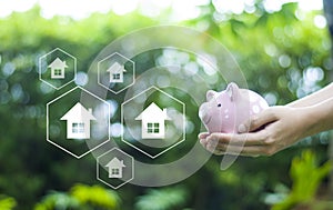 Saving money to buy a house in the future Real estate concept