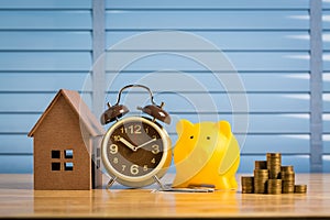 Saving money to buy a new home of its own money in the piggy bank. Lowest cost and tax.