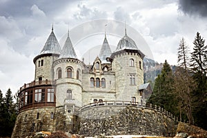 Savoia Castle on a cloudy day, Gressoney Saint Jean, Aosta, Italy photo
