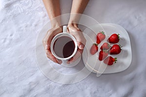 Savoring the Season: Cup of Tea and Fresh Strawberries