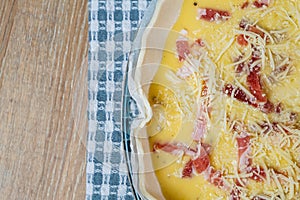 Savory bacon pie ready to bake