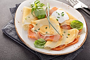 Savory crepes with salmon filling