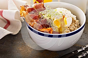 Savory oatmeal porridge with egg and bacon