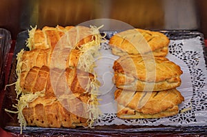 Savory pastries with cheese and meet at a bakery in Strasbourg, Alsace, France