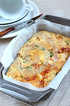 Savory Pie With Cheese, Tomatos And Ramsons photo