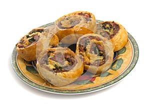 Savoury Pinwheels over white background