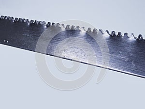 Saw blade, hacksaw, closeup stacking photo