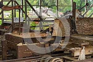 Sawdust Flies at Steam Powered Sawmill Rips Through Log