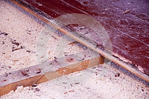 Sawdust insulation under old floor boards