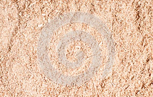 Sawdust or wood dust texture background. Wood sawdust background closeup. Sawdust floor texture. Top view. Saw dust texture, close