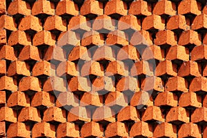 Sawtooth pattern brickwork. Decorative red brick wall as background