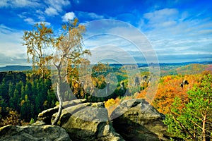 Saxon switzerland fairy tale view from carola rock at noon feather clouds blue sky