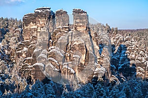 Saxon Switzerland rock formation in winter time