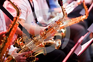 Saxophone in the hands of a musician