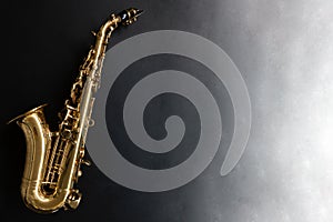 Saxophone jazz instruments. Soprano sax isolated. Saxophone music instrument closeup on black