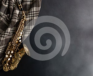 Saxophone jazz instruments. Soprano sax isolated. Saxophone music instrument closeup on black